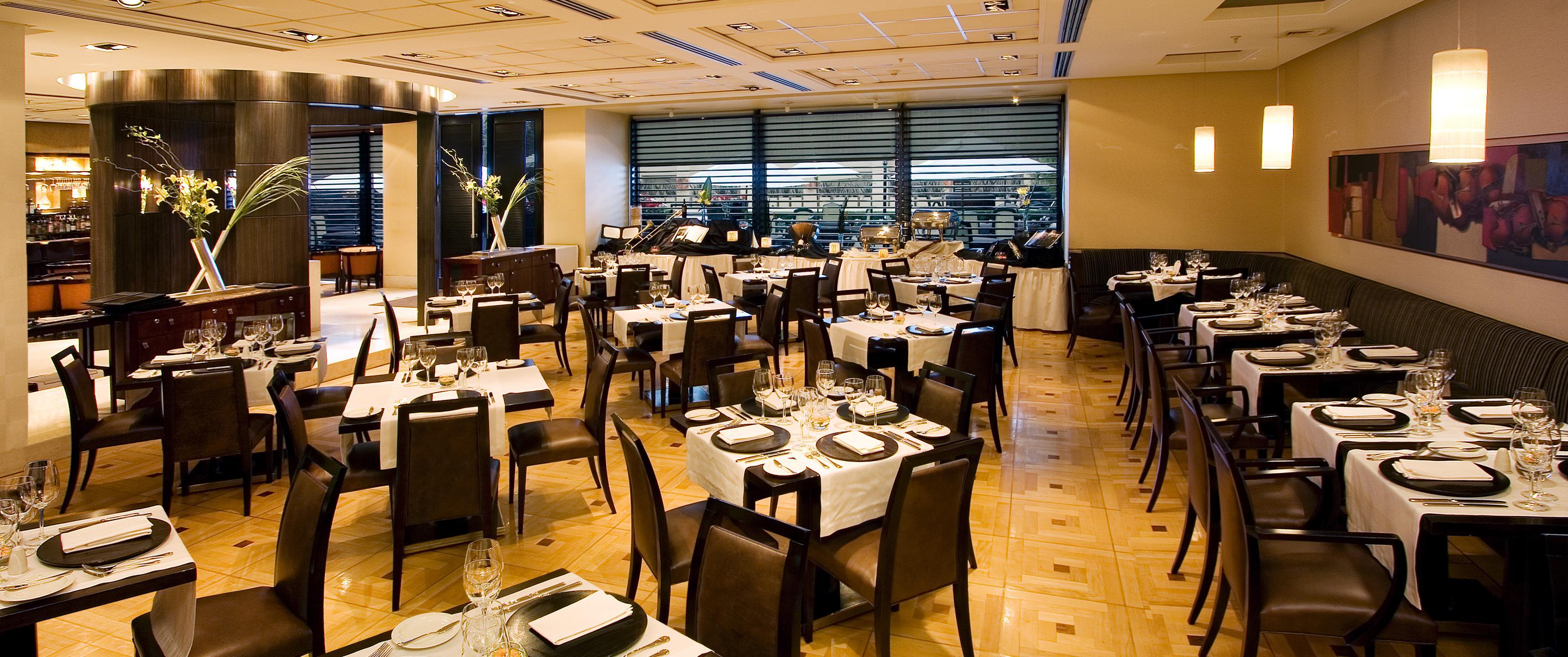 Regal Pacific Puerto Madero Hotel Buenos Aires Étterem fotó The interior of the restaurant